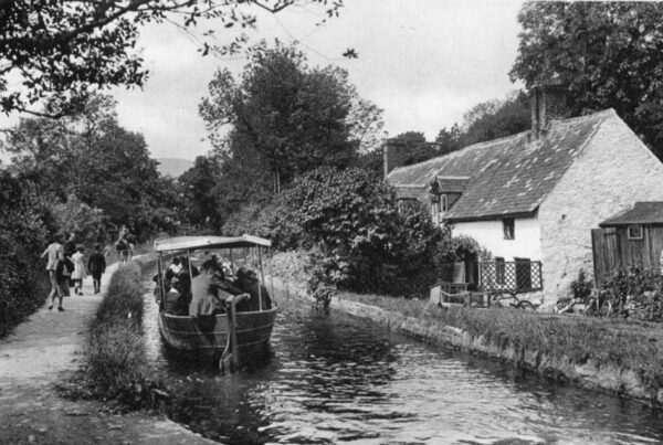 Llangollen Canal with horse drawn boat in front of Pen Dyffryn