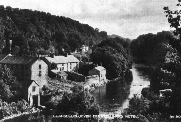 Looking at the Lower Dee Mill from the garden of the Hand Hotel.