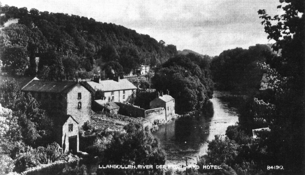 Looking at the Lower Dee Mill from the garden of the Hand Hotel.